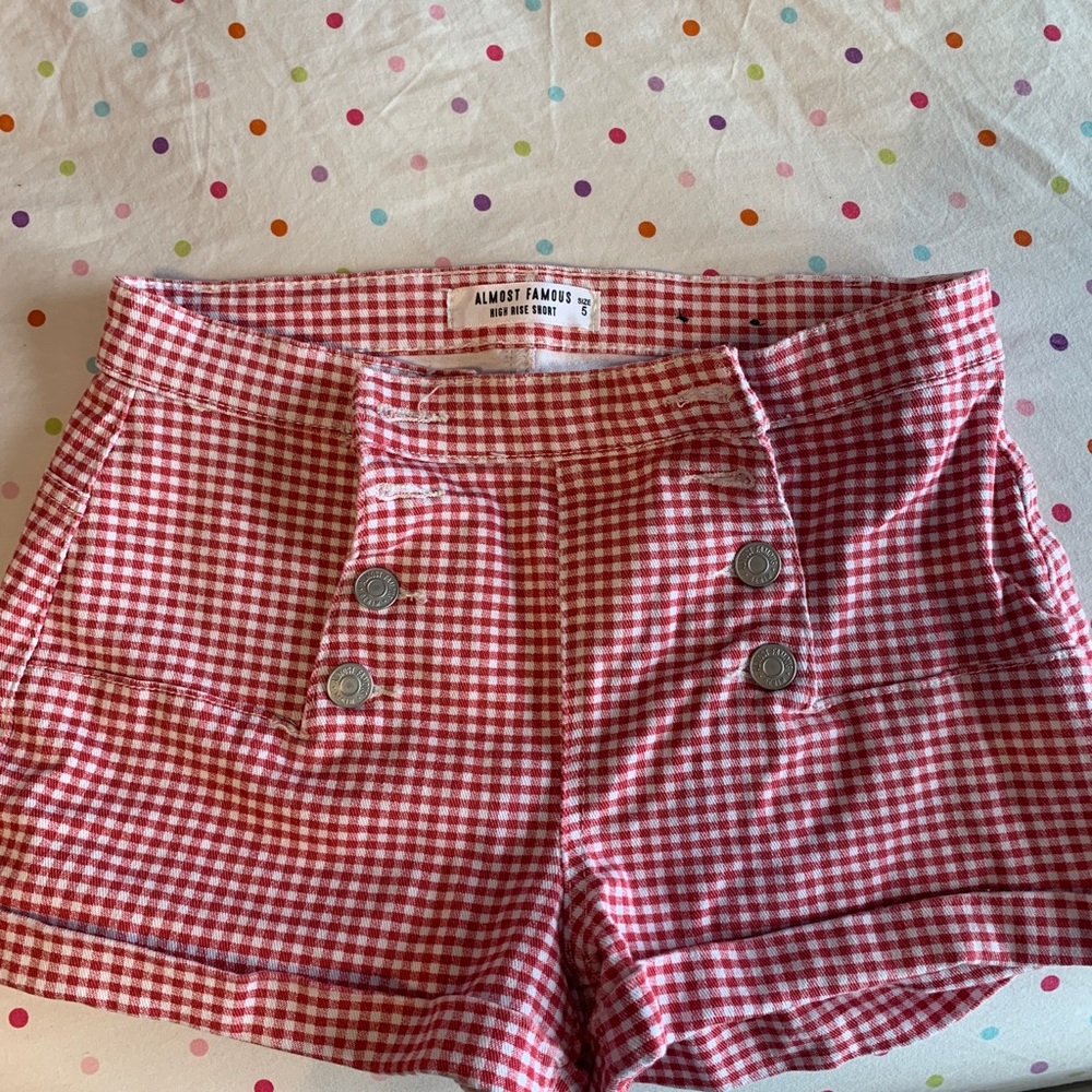 red and white patterned high rise shorts